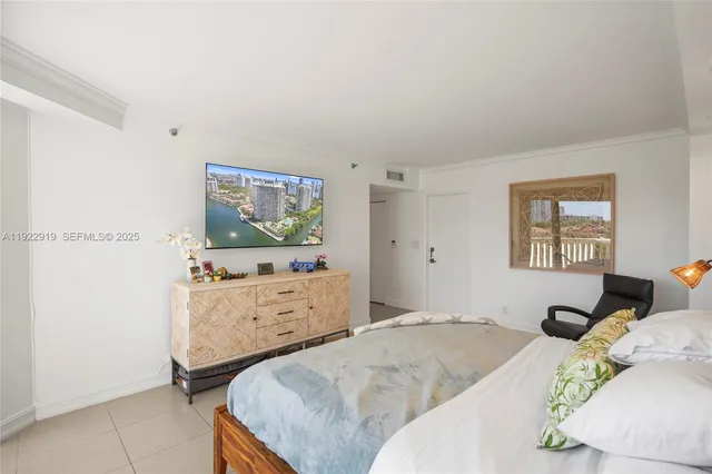 a bedroom with a bed and furniture