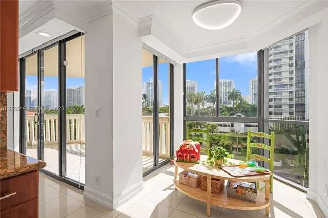 a room with furniture and a potted plant