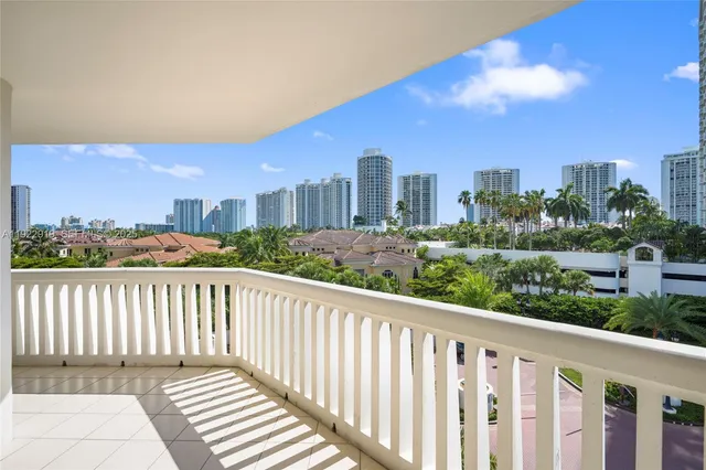 a view of a balcony with city view