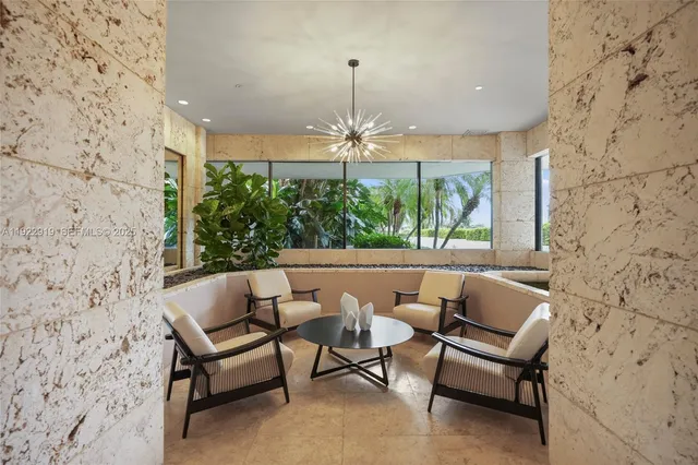 a view of a chairs and tables in the patio