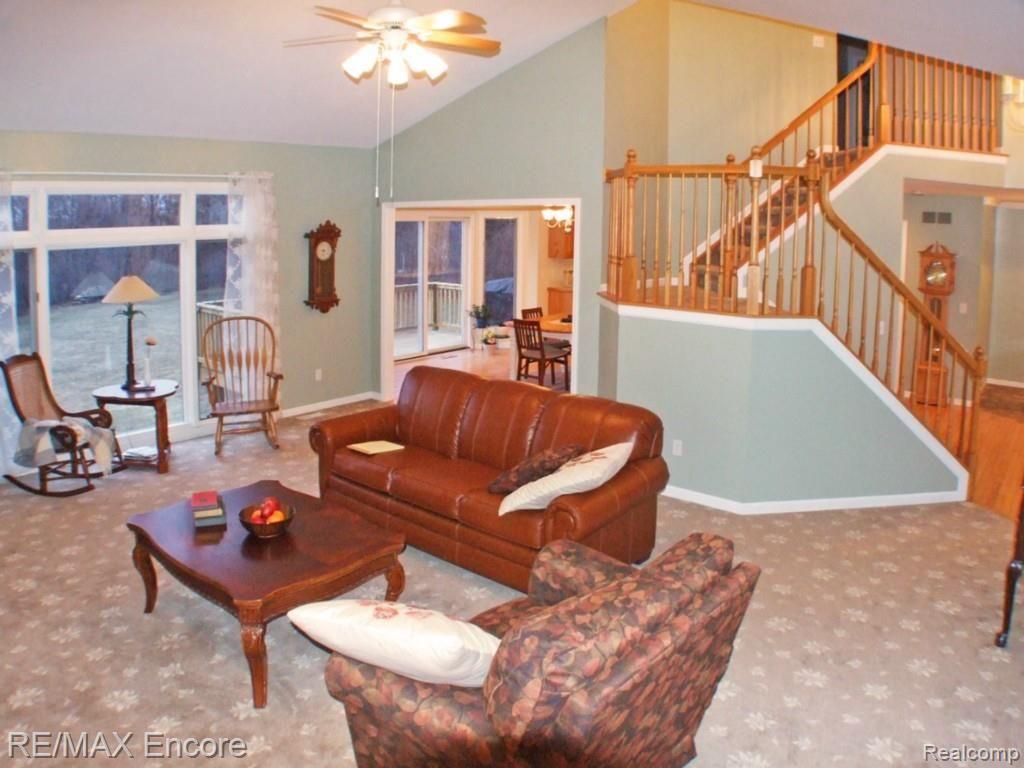 5458 Ridge Trail North Clarkston, MI 48348 - Photo 3 of 35 GREAT ROOM WITH LARGE PICTURE WINDOW AND CATHEDRAL CEILING