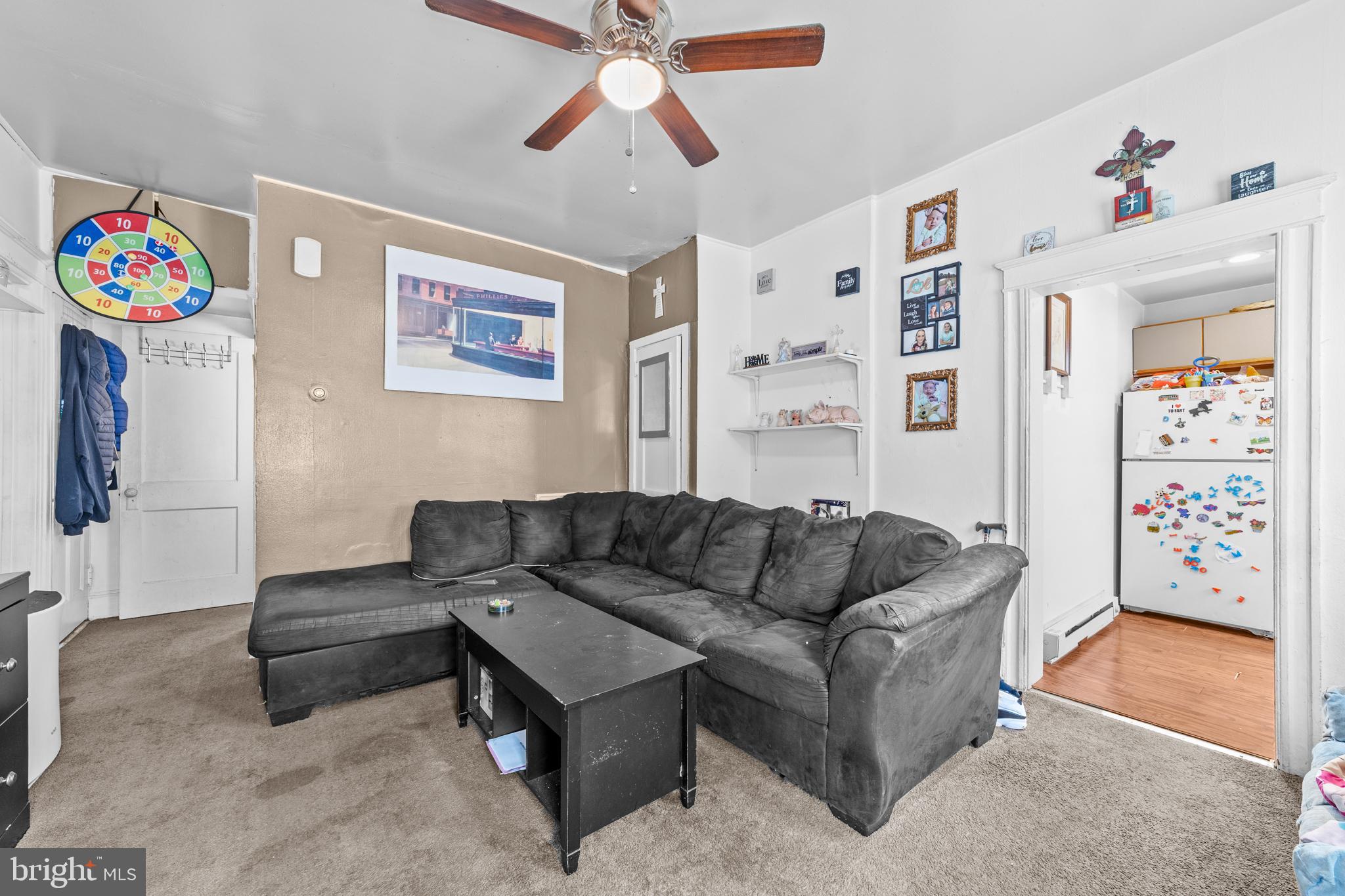 7333-35 Rising Sun Avenue Philadelphia, PA 19111 - Photo 15 of 28 a living room with furniture and a couch