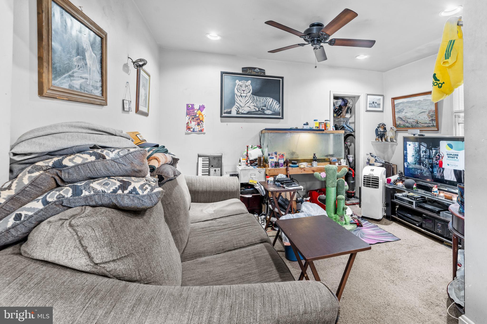 7333-35 Rising Sun Avenue Philadelphia, PA 19111 - Photo 20 of 28 a bedroom with furniture and a window