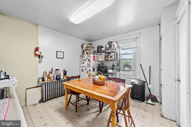 a view of a workspace with furniture