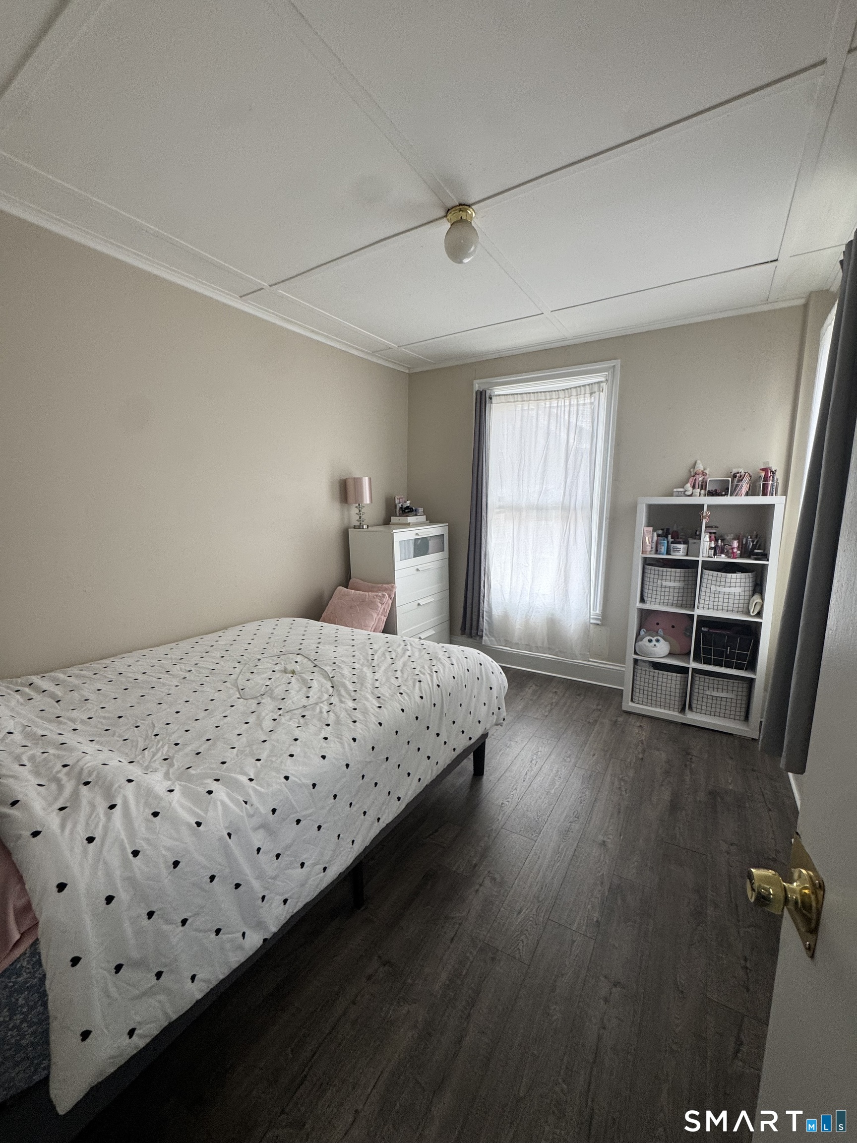 35 Cliff Street Norwich, CT 06360 - Photo 18 of 21 a bedroom with a bed and a window