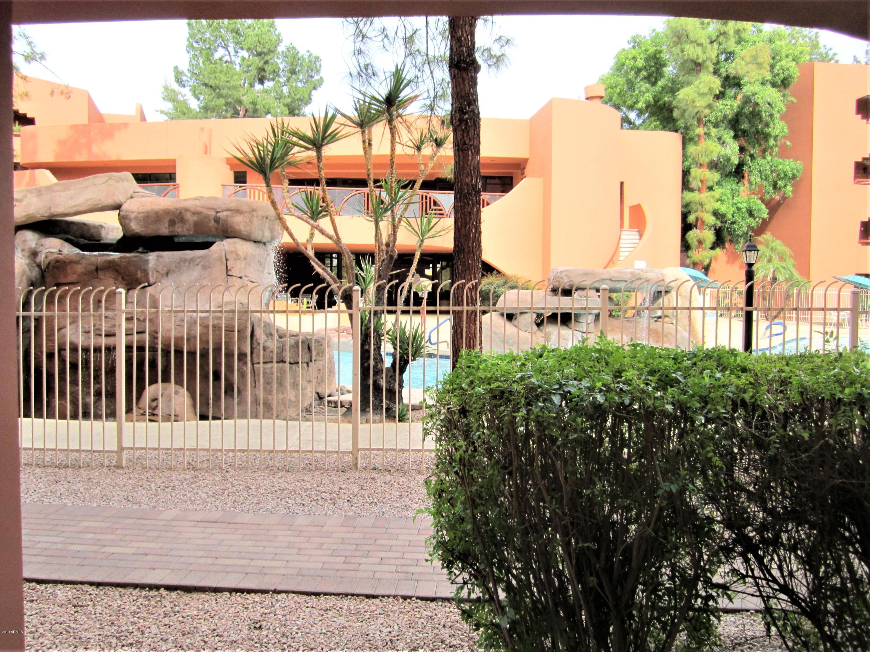 4303 East Cactus Road, Unit 116 Phoenix, AZ 85032 - Photo 24 of 35 a view of outdoor space and yard