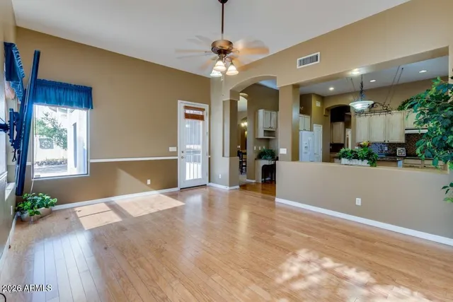 a view of a livingroom with wooden floor