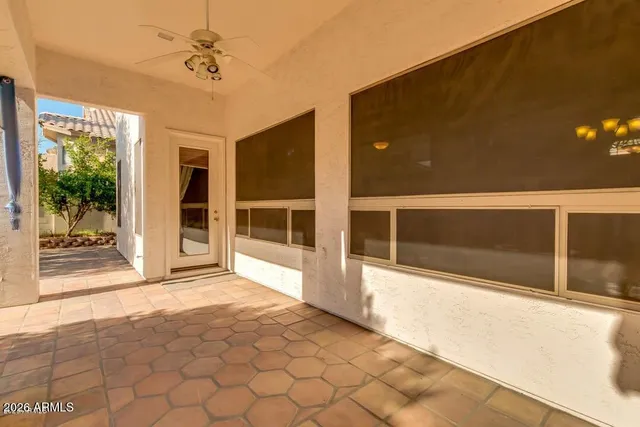 a view of a backyard with furniture