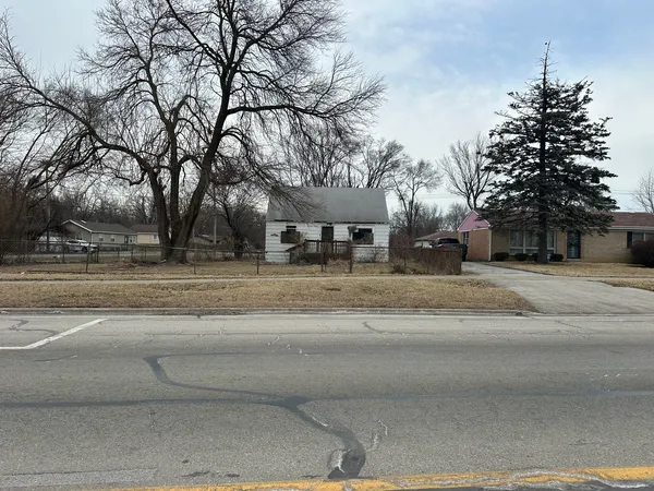 a view of road with trees