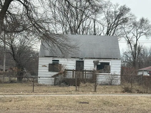 a view of house with outdoor space