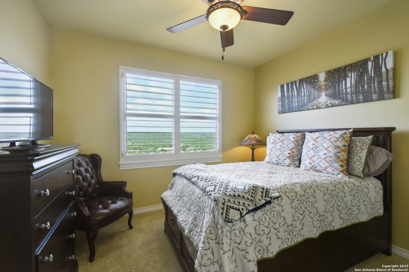 6527 Preakness Pass Bulverde, TX 78163 - Photo 19 of 22 a bedroom with a bed and a couch