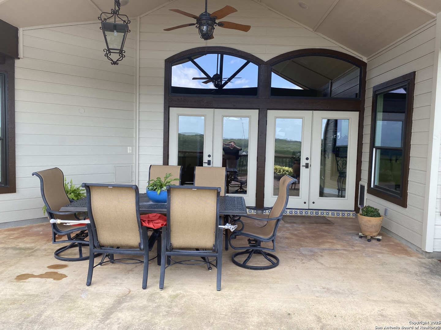 6527 Preakness Pass Bulverde, TX 78163 - Photo 7 of 22 a dining room with furniture and a floor to ceiling window