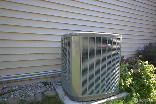 a backyard of a house with seating space