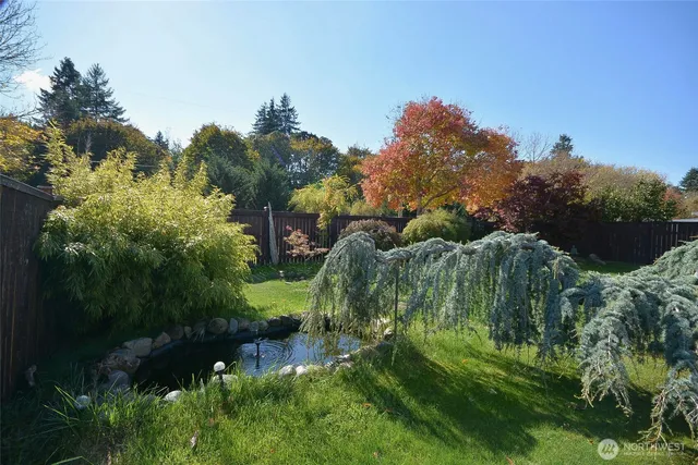 an aerial view of multiple houses with outdoor space