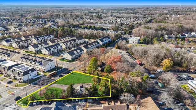 an aerial view of house with yard