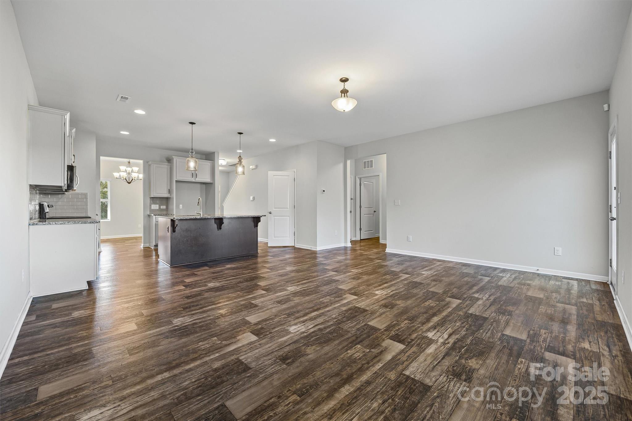 730 Gants Road York, SC 29745 - Photo 14 of 37 a view of kitchen with kitchen island microwave and cabinets