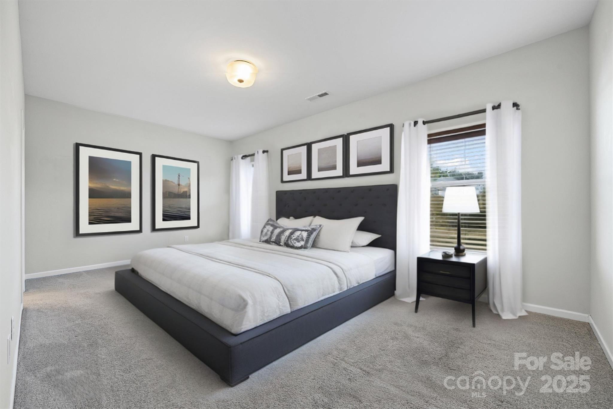 730 Gants Road York, SC 29745 - Photo 18 of 37 a bedroom with a bed and window