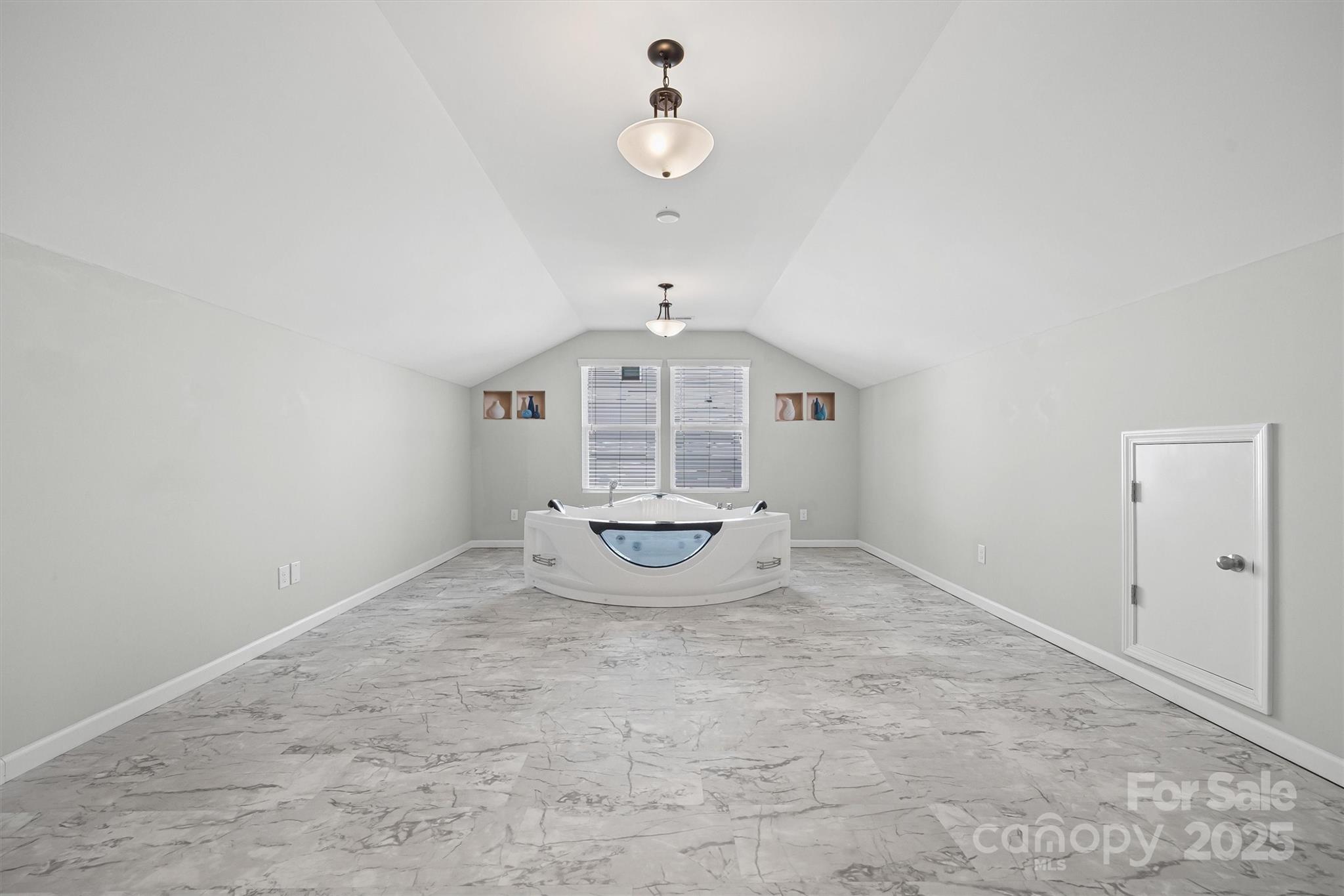 730 Gants Road York, SC 29745 - Photo 23 of 37 an empty room with windows and fan