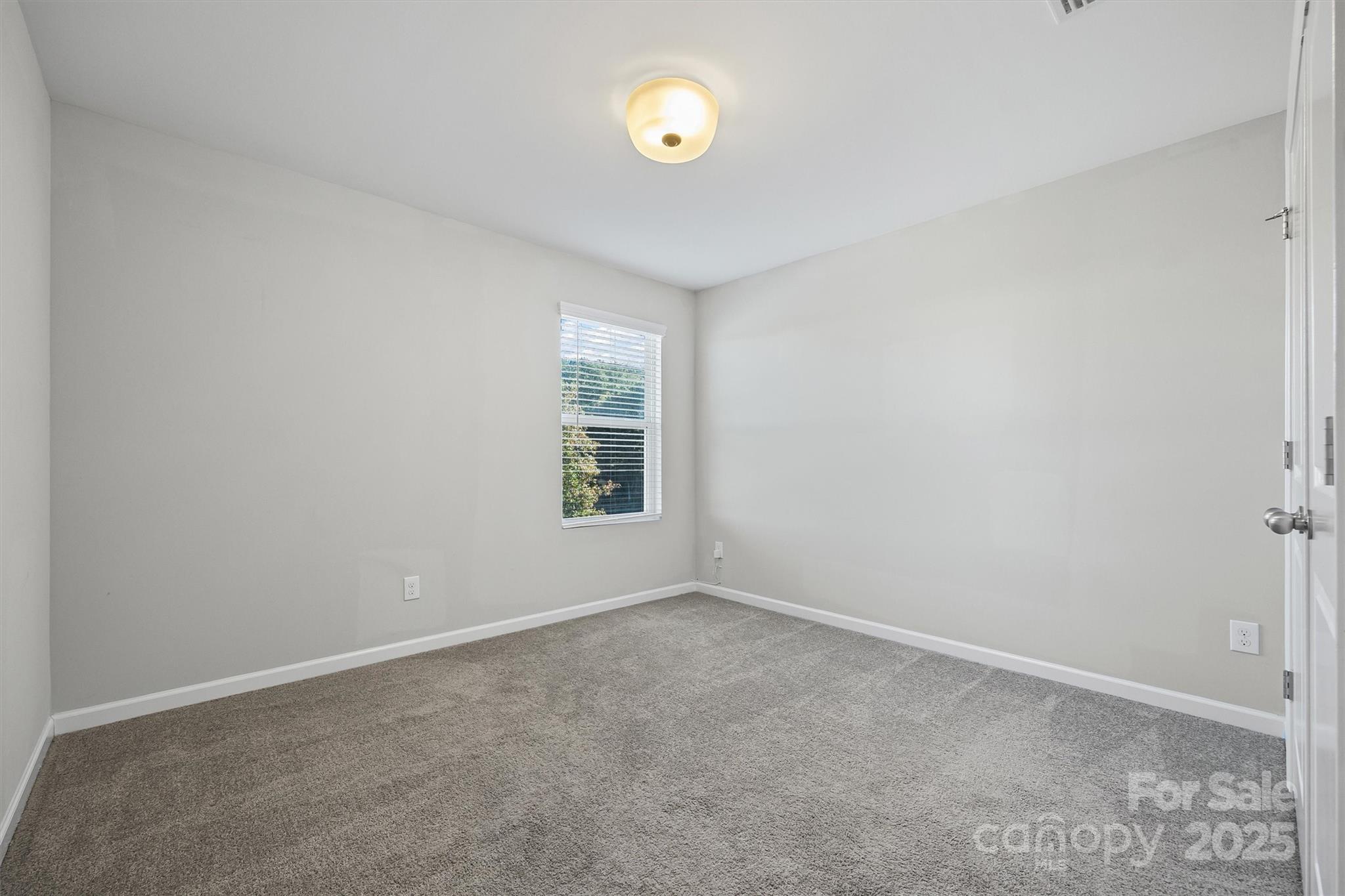 730 Gants Road York, SC 29745 - Photo 26 of 37 an empty room with a window