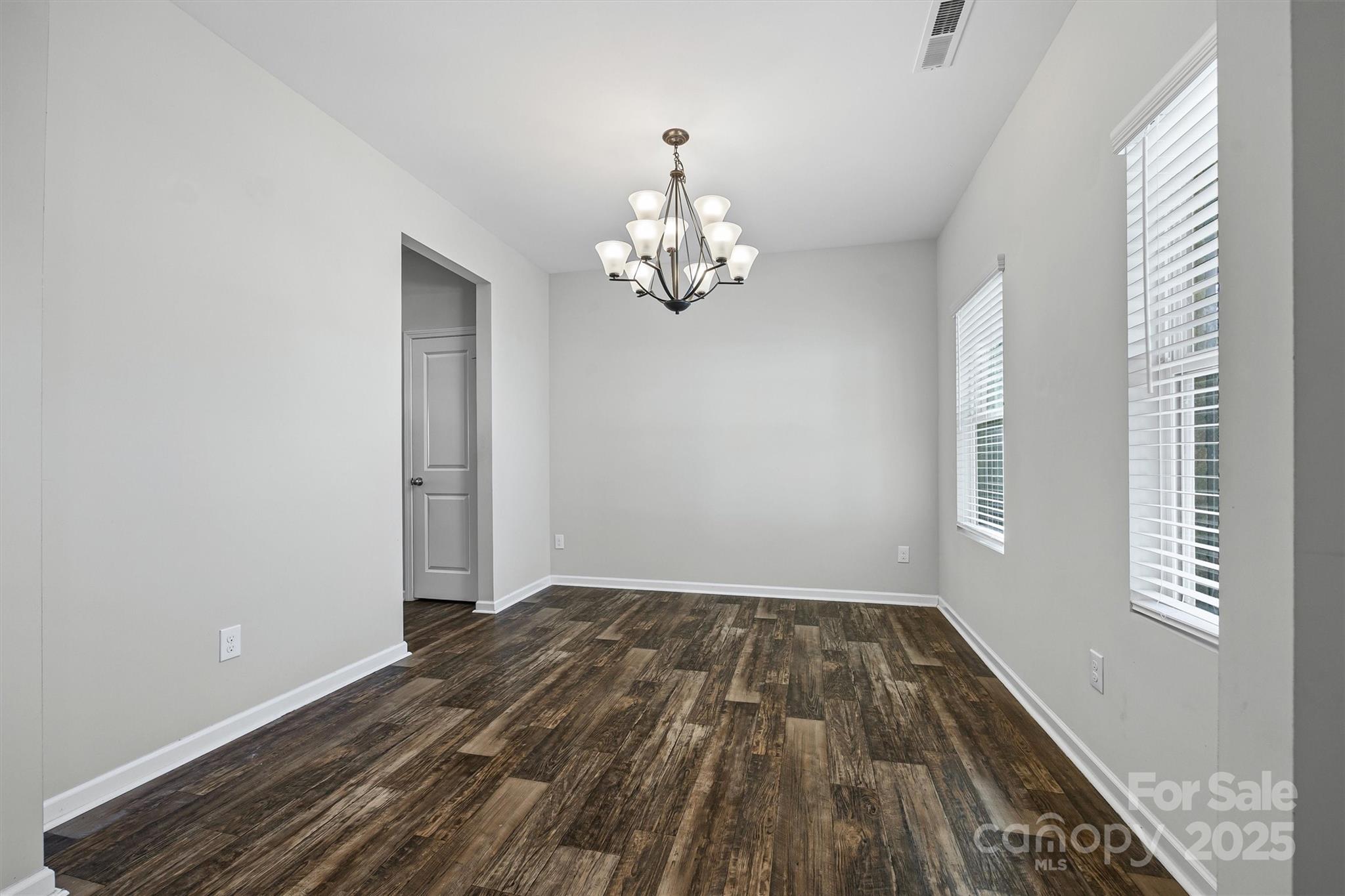 730 Gants Road York, SC 29745 - Photo 4 of 37 a view of a room with wooden floor chandelier and a window