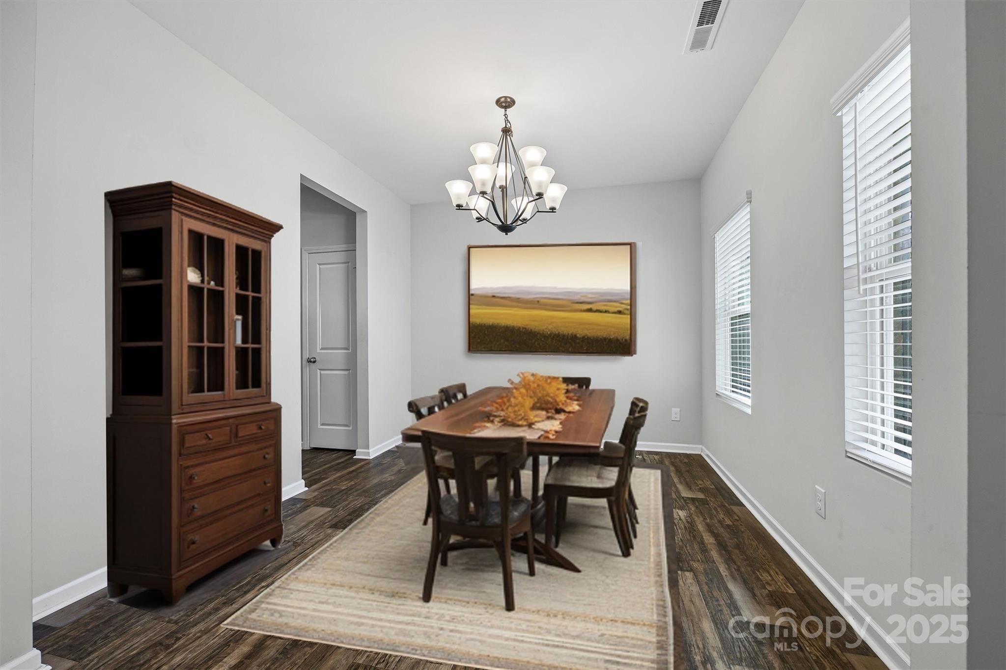 730 Gants Road York, SC 29745 - Photo 5 of 37 a dining room with furniture a chandelier and wooden floor