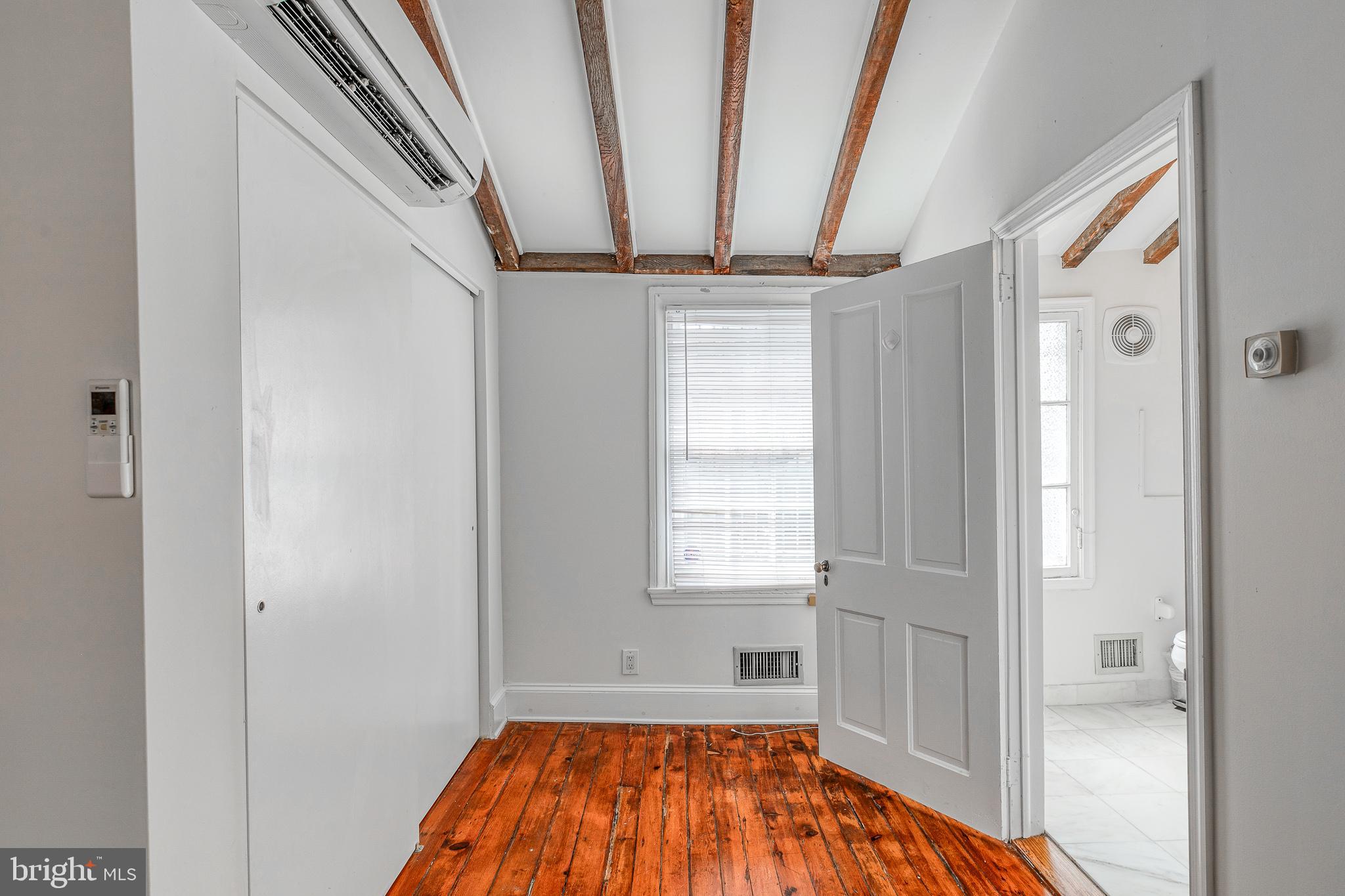 1714 Rittenhouse Square Philadelphia, PA 19103 - Photo 16 of 21 a view of a room with wooden floor and staircase
