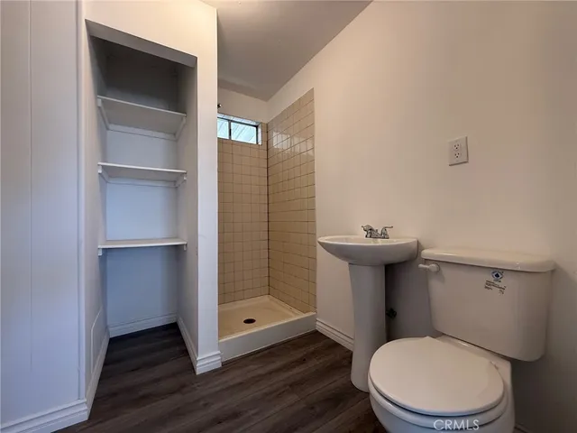 a bathroom with a toilet and a sink