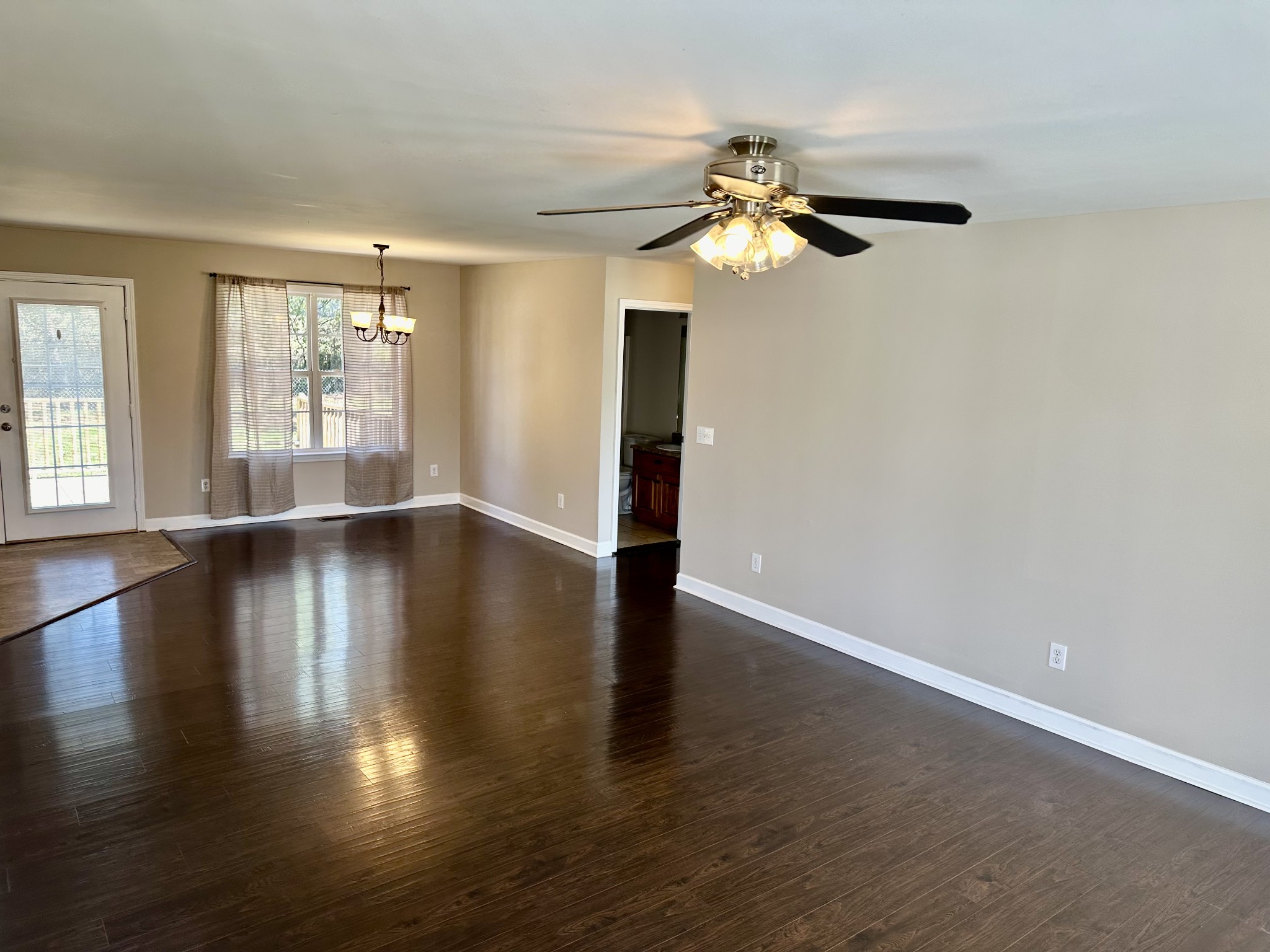 265 Sagewood Drive Pulaski, TN 38478 - Photo 5 of 16 a view of empty room with wooden floor and fan