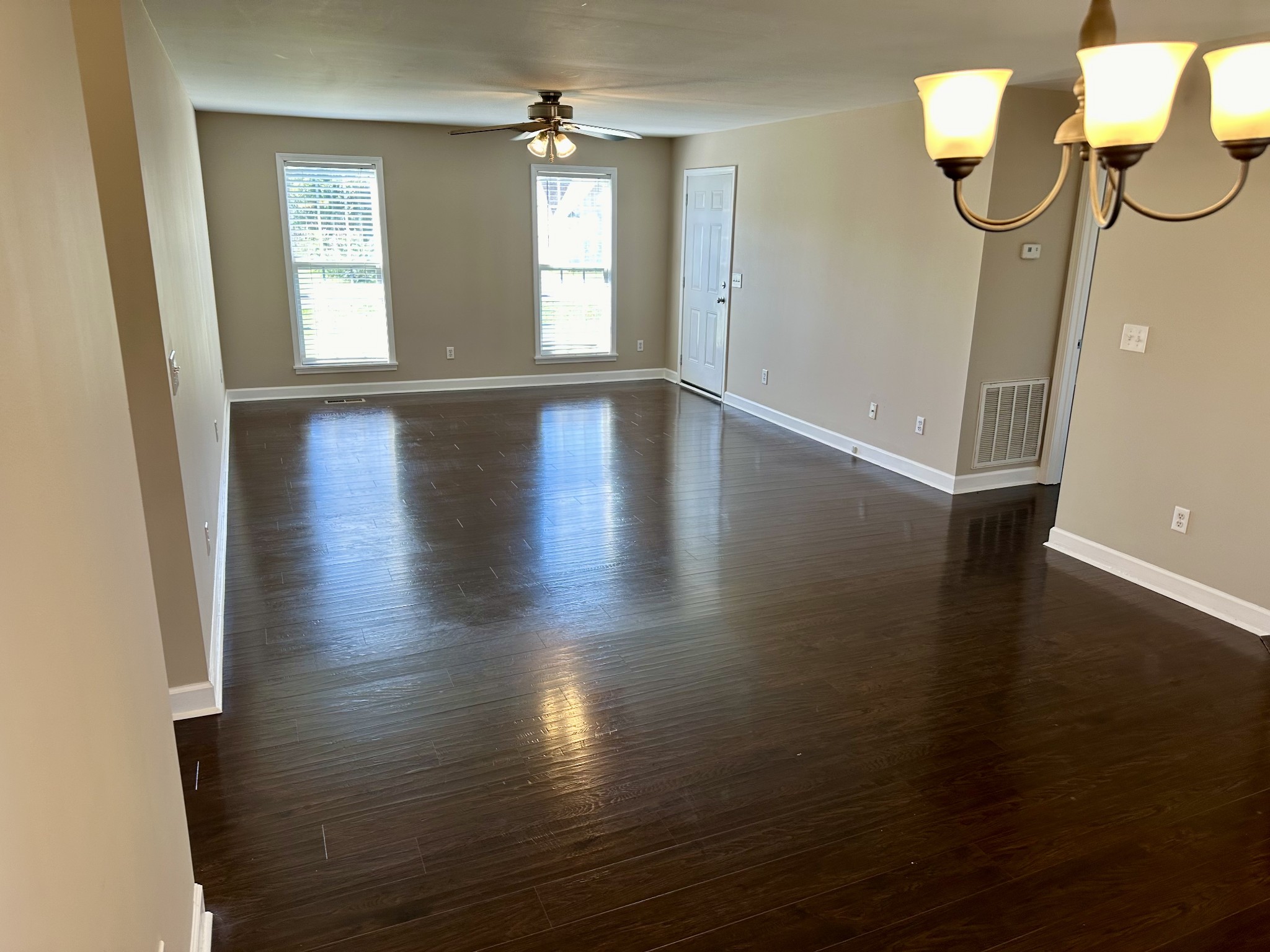 265 Sagewood Drive Pulaski, TN 38478 - Photo 6 of 16 a view of an empty room with wooden floor and a window