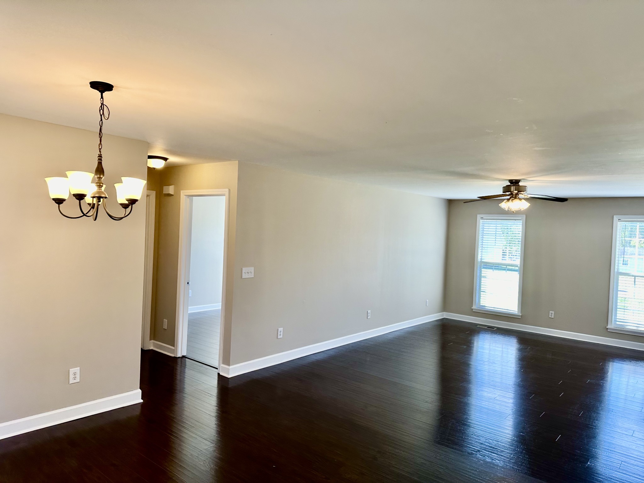 265 Sagewood Drive Pulaski, TN 38478 - Photo 9 of 16 a view of an empty room with wooden floor and a window