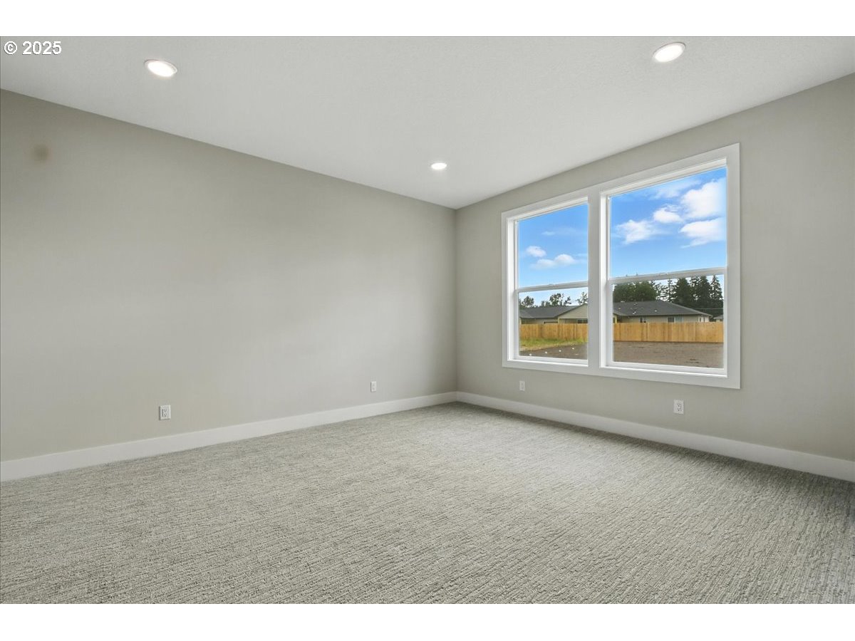 121 Gassman Road Castle Rock, WA 98611 - Photo 12 of 29 a view of an empty room with a window