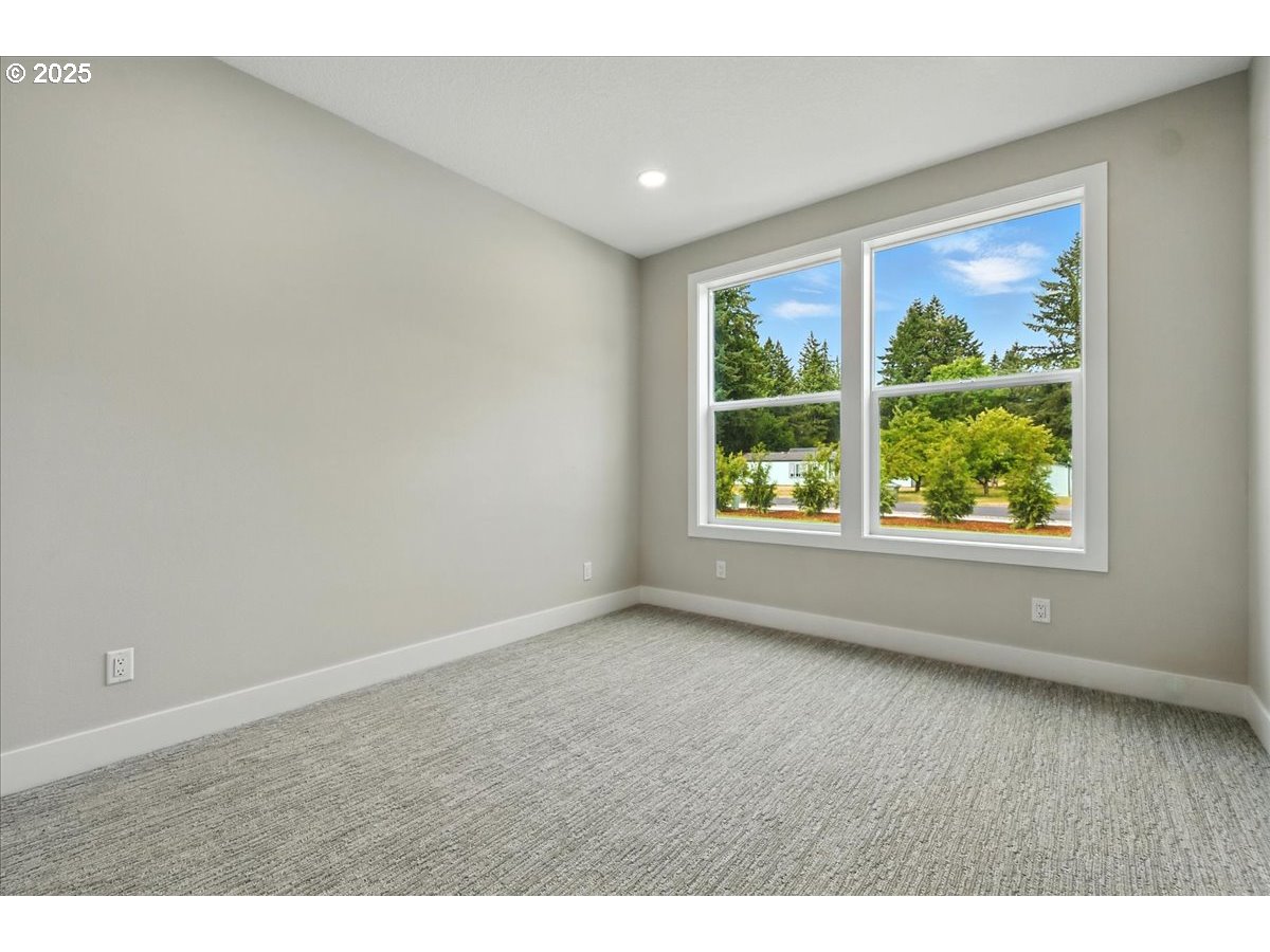 121 Gassman Road Castle Rock, WA 98611 - Photo 17 of 29 a view of an empty room with a window