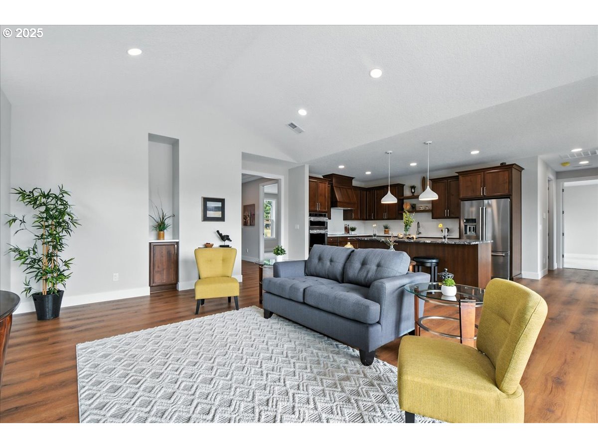 121 Gassman Road Castle Rock, WA 98611 - Photo 6 of 29 a living room with furniture and a potted plant