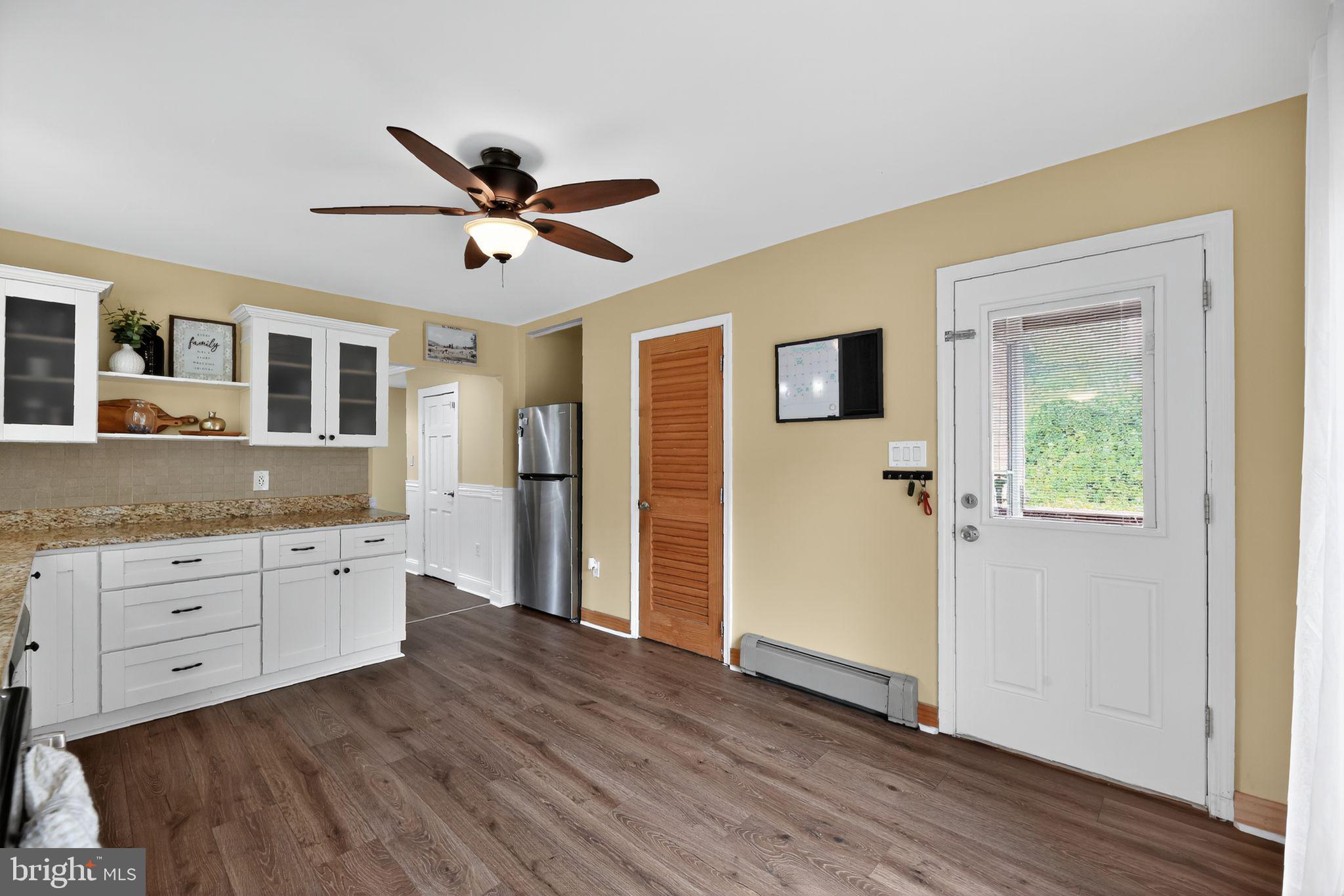 1115 Bridgeboro Road Beverly, NJ 08010 - Photo 12 of 39 a spacious bathroom with a granite countertop sink and a mirror