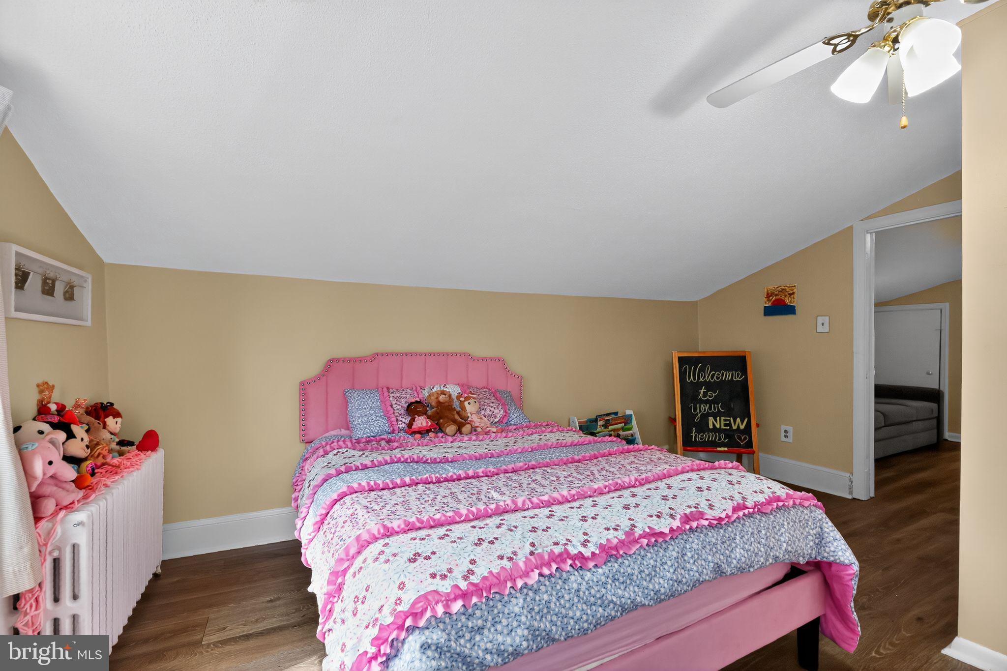 1115 Bridgeboro Road Beverly, NJ 08010 - Photo 20 of 39 a bedroom with a large bed and a closet