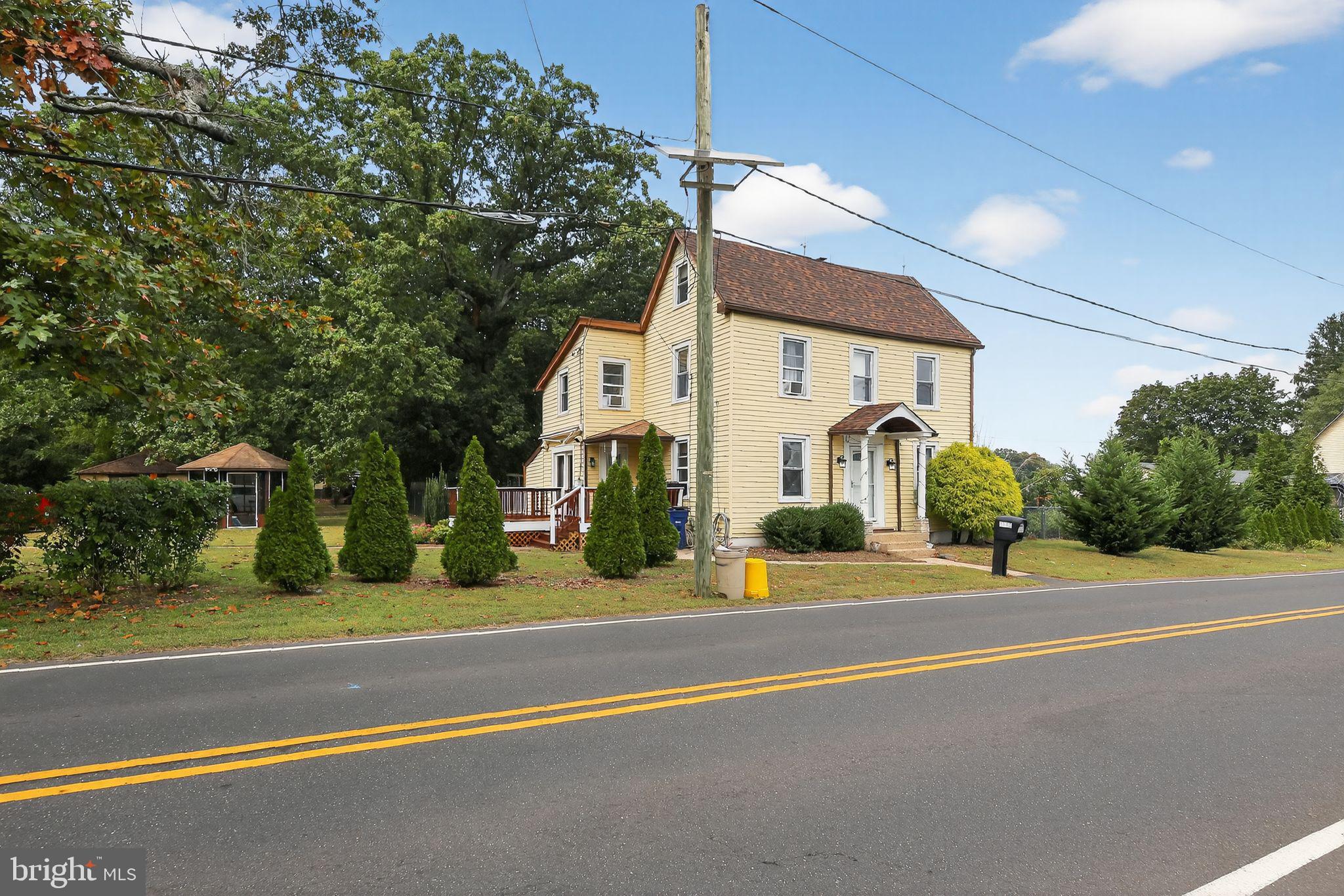 1115 Bridgeboro Road Beverly, NJ 08010 - Photo 3 of 39 a view of a building with a street
