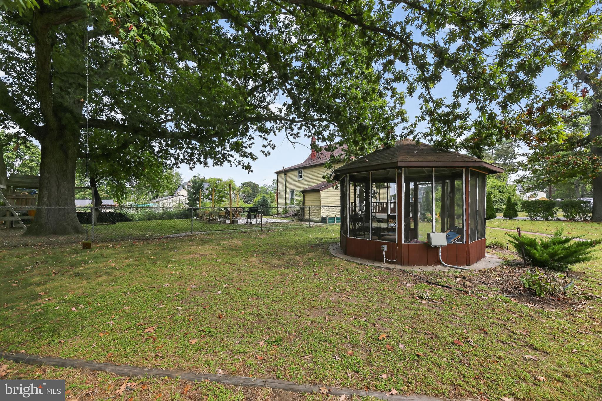 1115 Bridgeboro Road Beverly, NJ 08010 - Photo 34 of 39 a view of a house with backyard and sitting area
