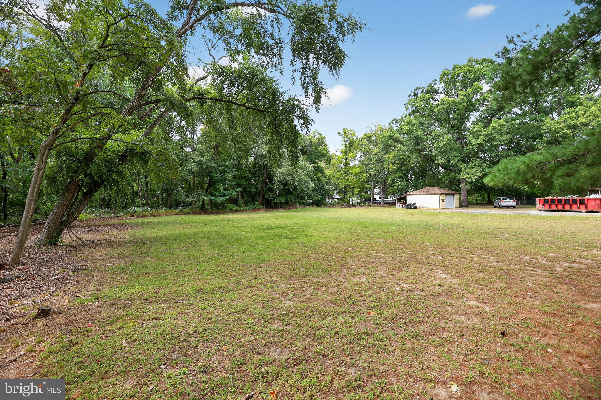 1115 Bridgeboro Road Beverly, NJ 08010 - Photo 36 of 39 a view of a green field with trees