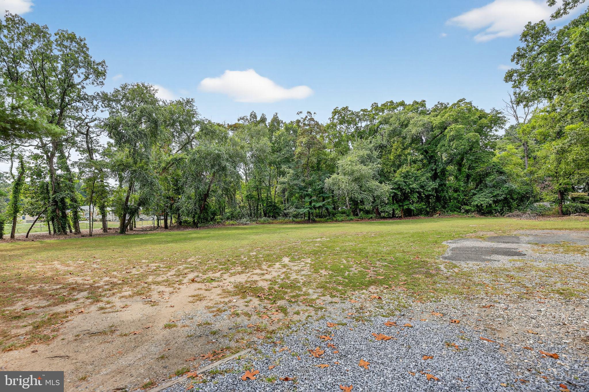 1115 Bridgeboro Road Beverly, NJ 08010 - Photo 39 of 39 a view of a field with trees in the background