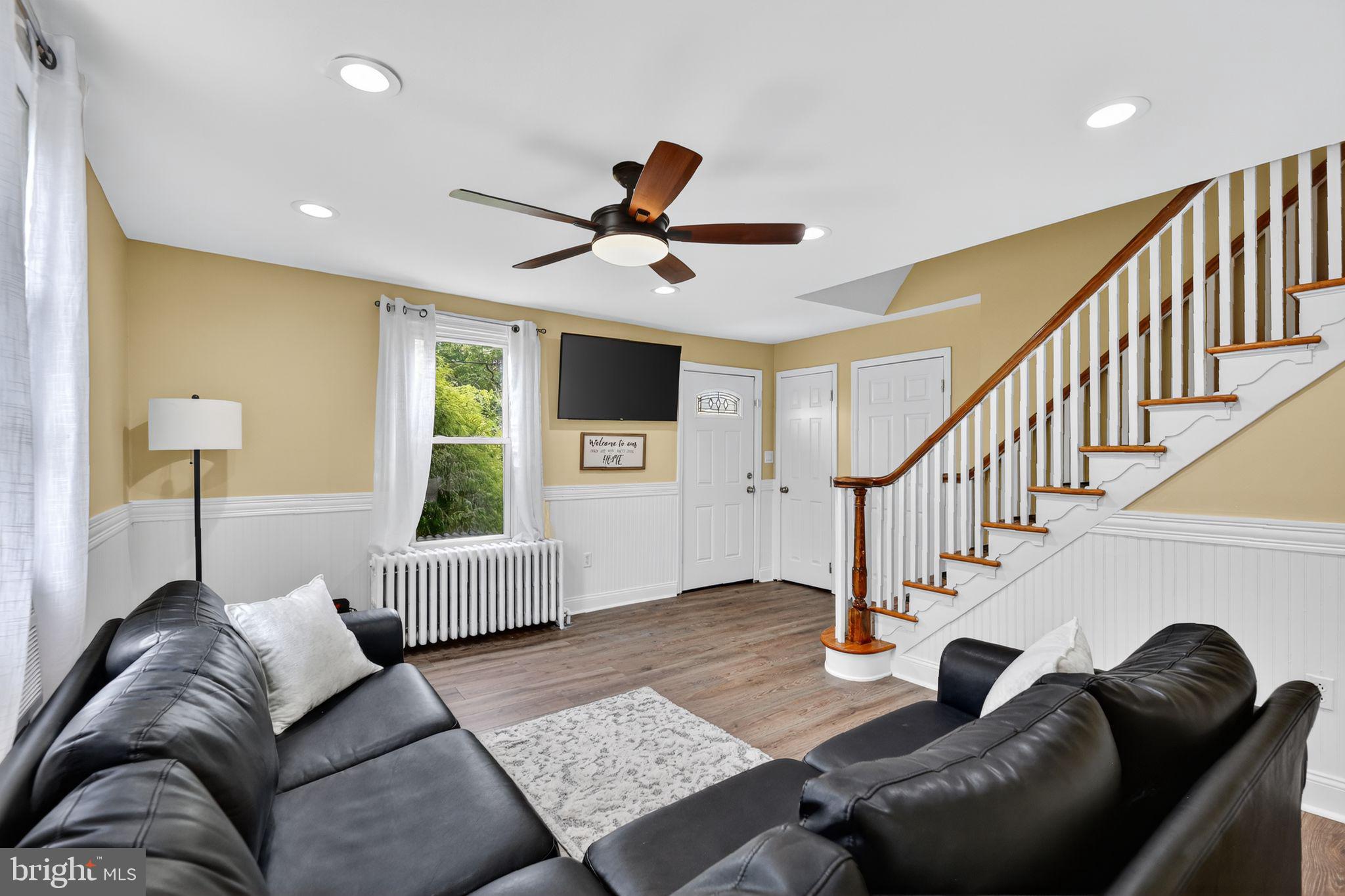 1115 Bridgeboro Road Beverly, NJ 08010 - Photo 5 of 39 a living room with furniture and a window