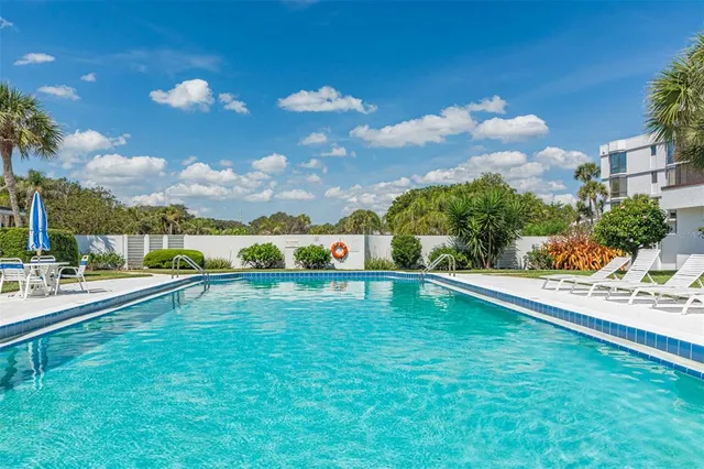 a view of an swimming pool and outdoor space