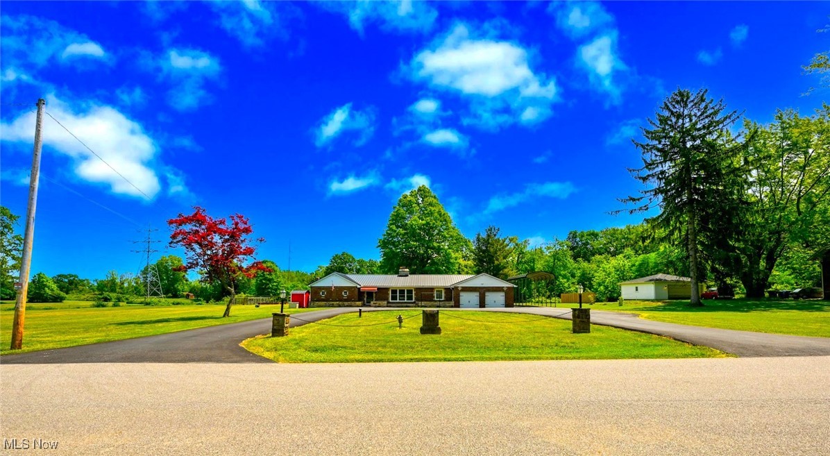 4597 Rock Cut Road Barberton, OH 44203 - Photo 40 of 44 *FRONT ROAD VIEW HAS GREAT CURB APPEAL W/BRICK PILLARS AND LIGHTING OUTSIDE ~