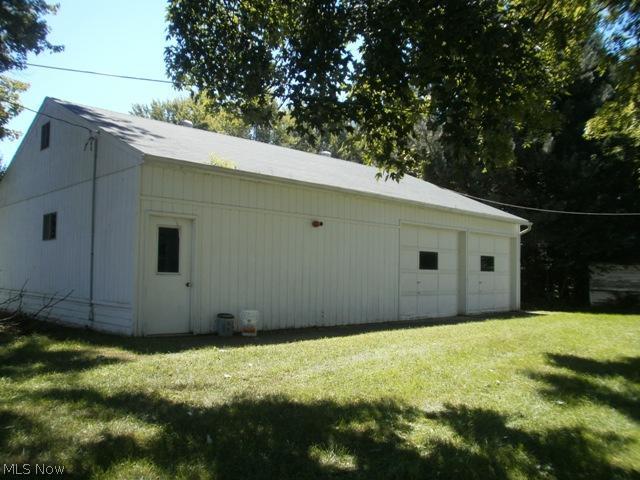 825 North Ridge Road Lorain, OH 44053 - Photo 14 of 21 Large storage out building! Unparalleled design for all reasons! See all you can fit in!