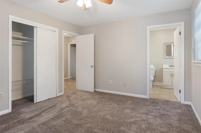 an empty room with a bathroom