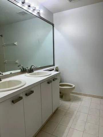 a bathroom with a shower and a bath tub