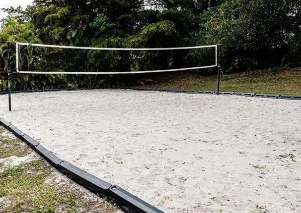 a view of a sign board with buildings