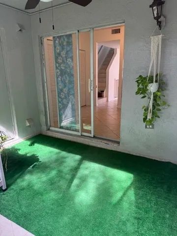 an aerial view of residential houses with outdoor space and garden