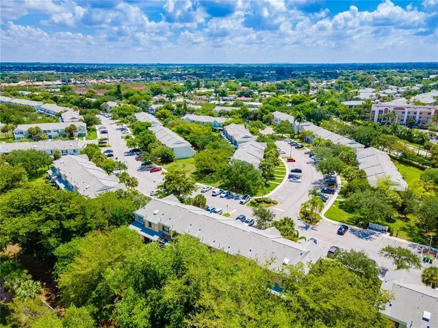 a view of a building with a yard