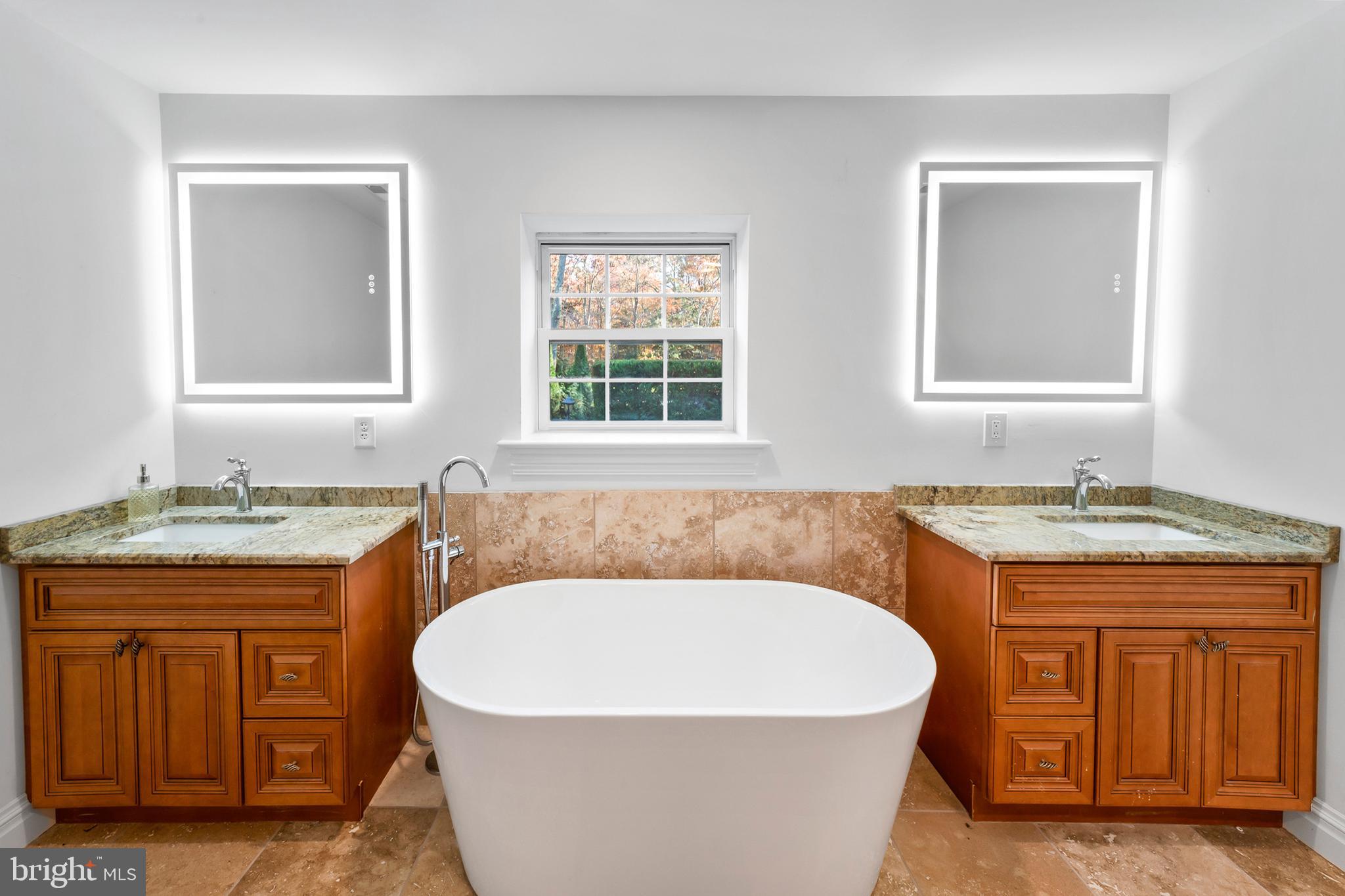 367 Hartford Road Mount Laurel, NJ 08054 - Photo 18 of 35 a white bath tub sitting in a bathroom and mirror