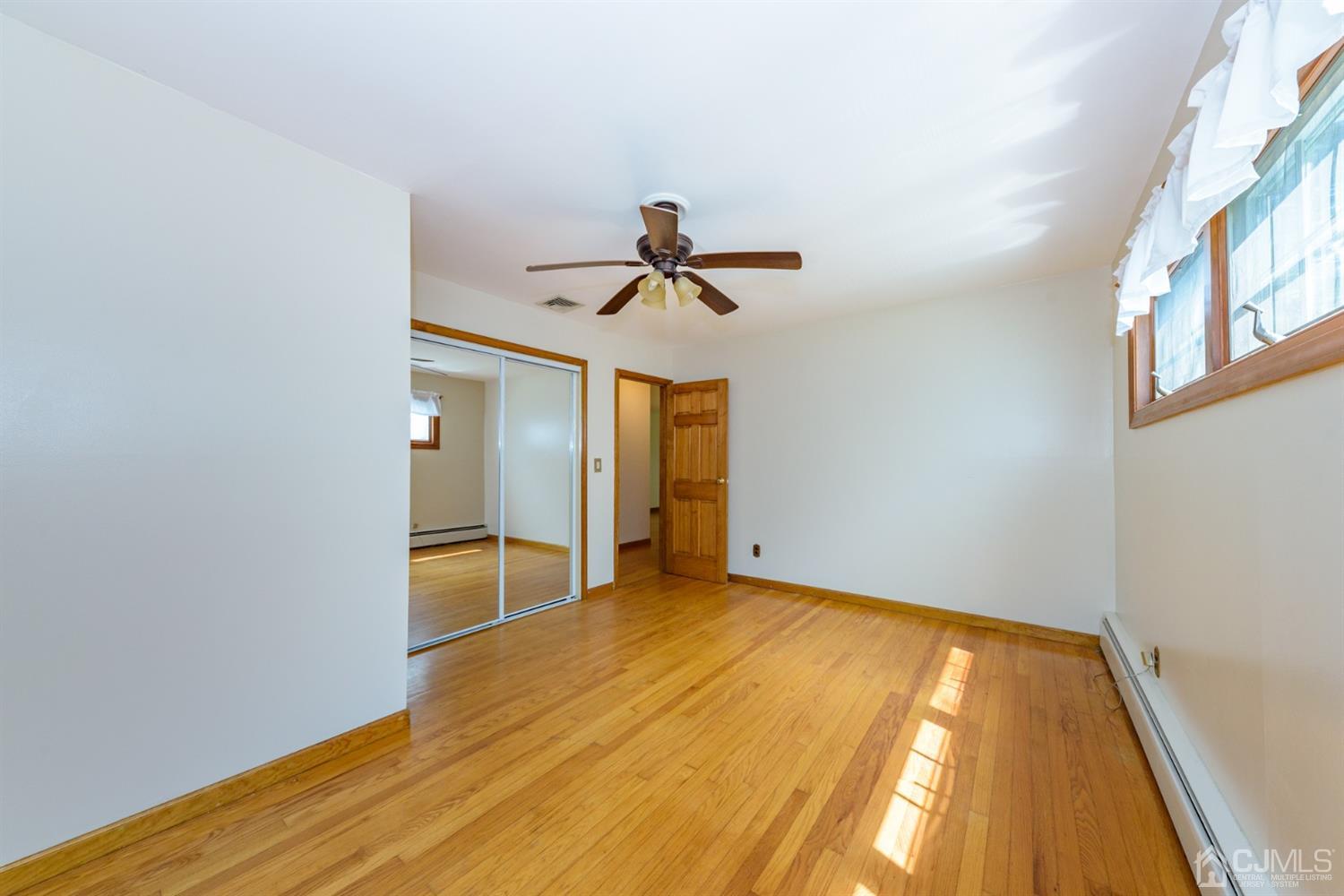 363 Rockport Road Port Murray, NJ 07865 - Photo 15 of 23 a view of empty room with wooden floor